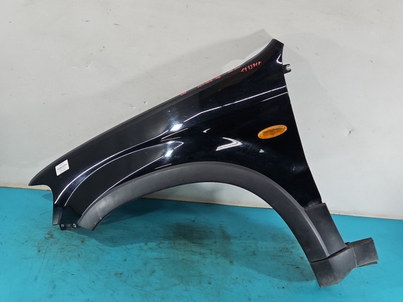 Błotnik przód lewy Ford Maverick II 01-07 czarny
