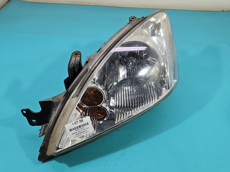 Reflektor lewy lampa przód Mitsubishi Lancer VII EUROPA