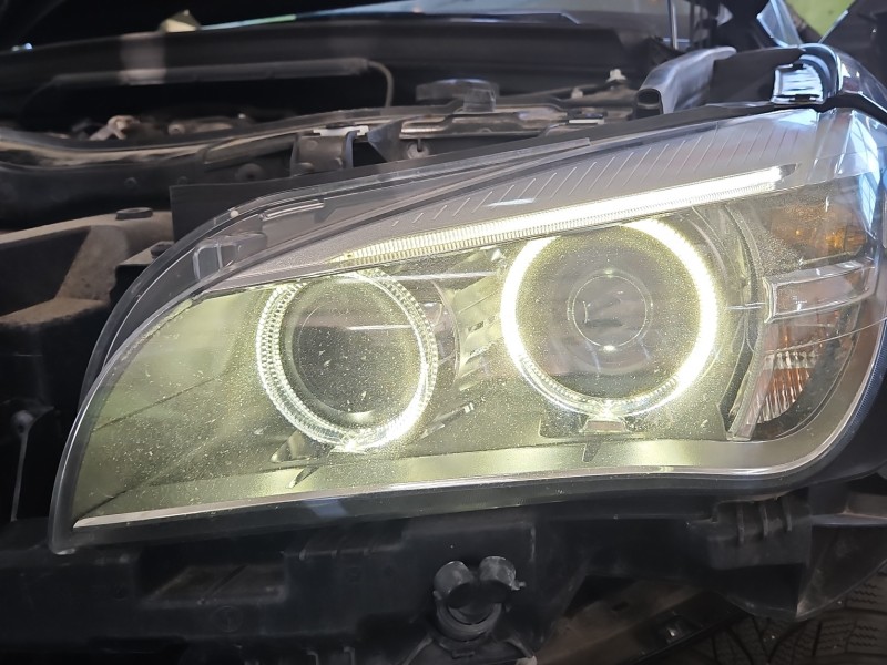 Reflektor lewy lampa przód BMW X1 E84 EUROPA 90018090, 7290239