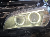 Reflektor lewy lampa przód BMW X1 E84 EUROPA 90018090, 7290239