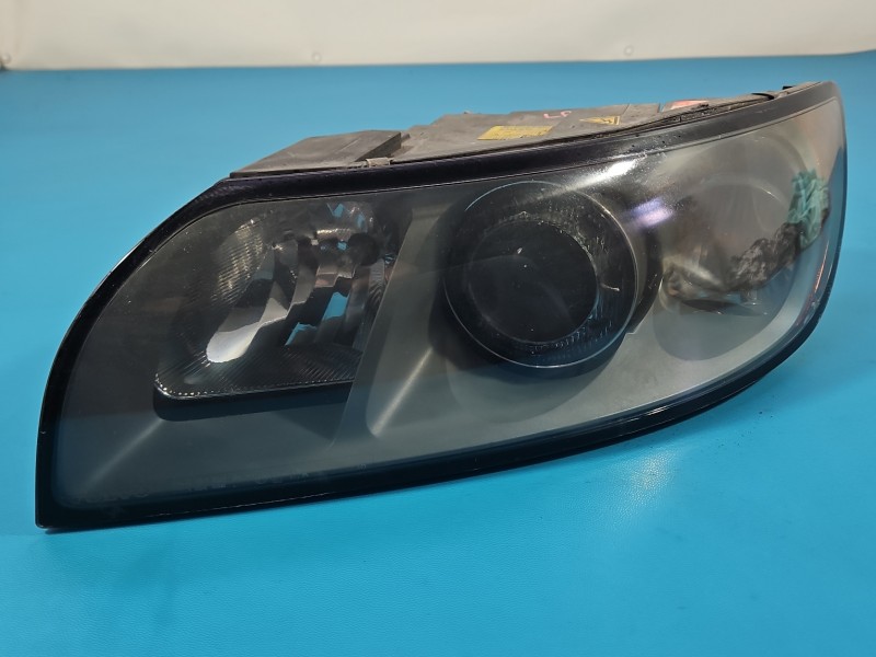 Reflektor lewy lampa przód Volvo V50 S40 II EUROPA 30698889, 0301198273