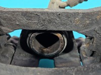 Zacisk tył lewy Toyota Land Cruiser 120 J120 3.0 D4D (1KD) HB