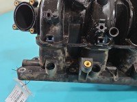 Kolektor ssący Opel Astra IV J 55573811 1.6 16V