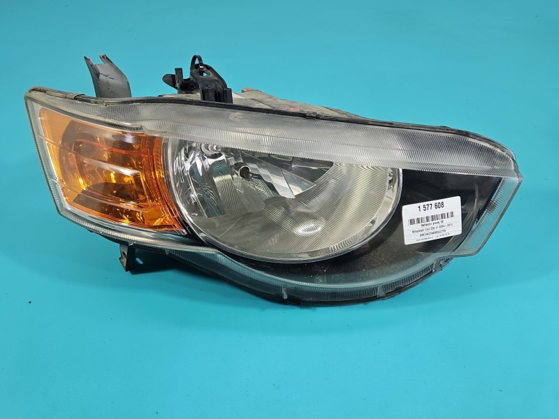 Reflektor prawy lampa przód Mitsubishi Colt Z30 VI 04- EUROPA 030124930200, 8301B180