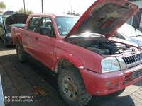 Szyba drzwi przód lewa Mitsubishi L200 HB