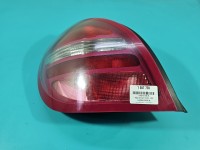 Lampa tył lewa Nissan Almera N16 HB lekko nadpalony otwór na żarówkę porysowana Z LISTWĄ ŻARÓWKOWĄ 00-03 PRZED LIFTEM...