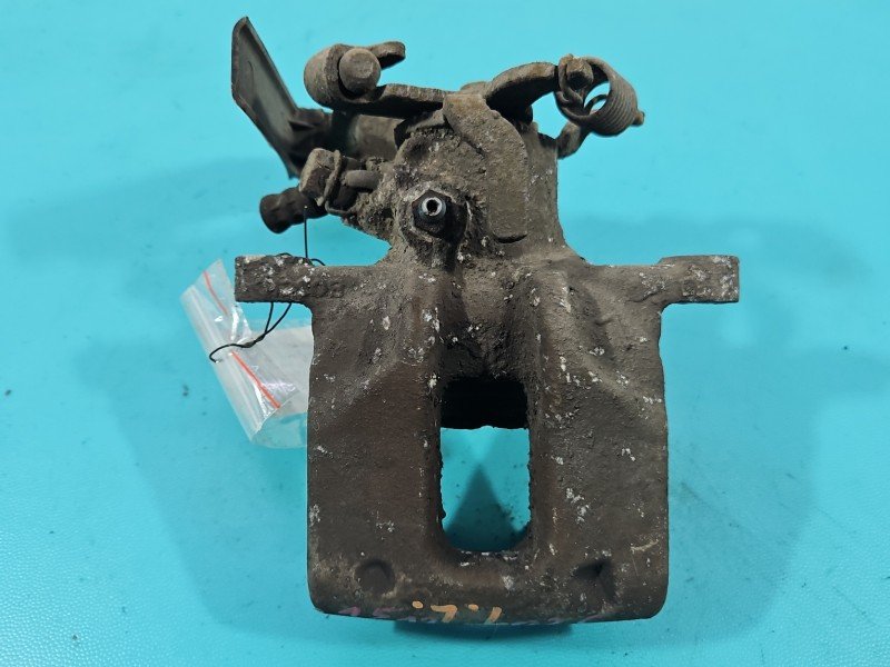 Zacisk tył lewy Toyota Auris II 1.6 16V HB