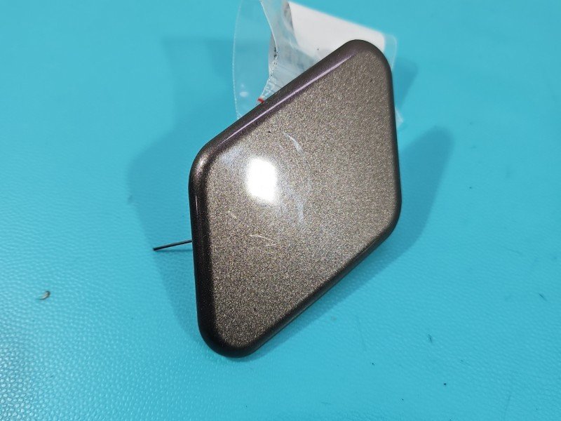 Zaślepka spryskiwacza lewa Kia Sportage III 10-15