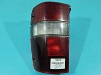 Lampa tył lewa Producent części: OPEL, Ichikoh, pęknięty klosz wewnątrz, rysy Opel Monterey HB