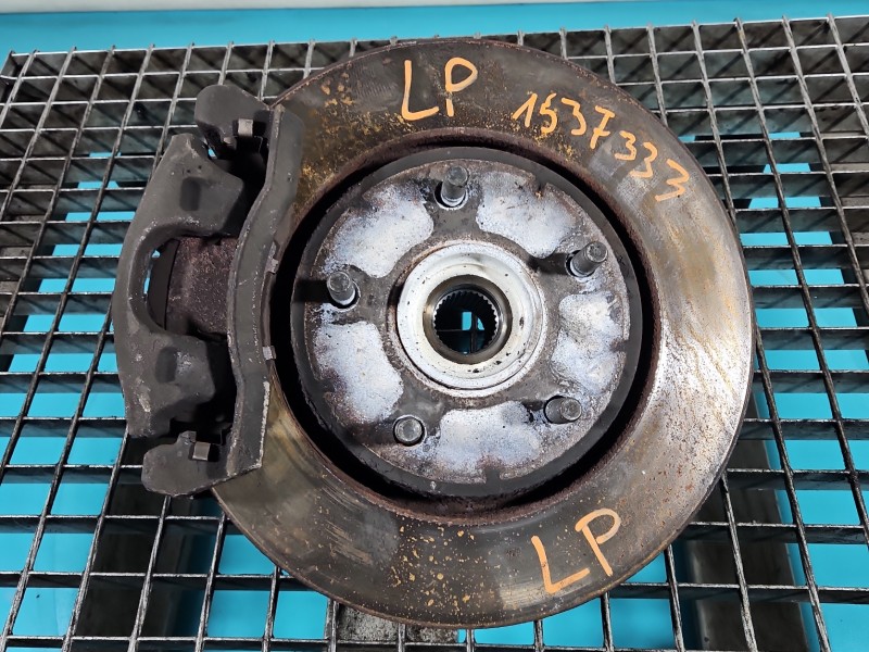 Zwrotnica lewa piasta przód 3.3 V6 Dodge Caravan V 07-20