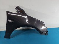 Błotnik przód prawy Opel Astra IV J grafitowy