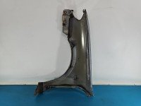 Błotnik przód prawy Nissan Almera N16 srebrny