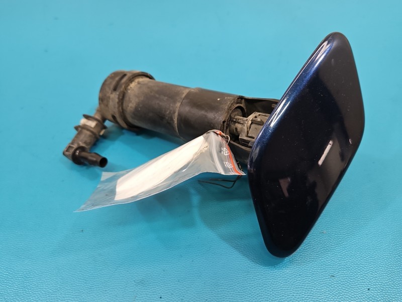 Spryskiwacz reflektora lewy Nissan Note I E11 28612-9U000