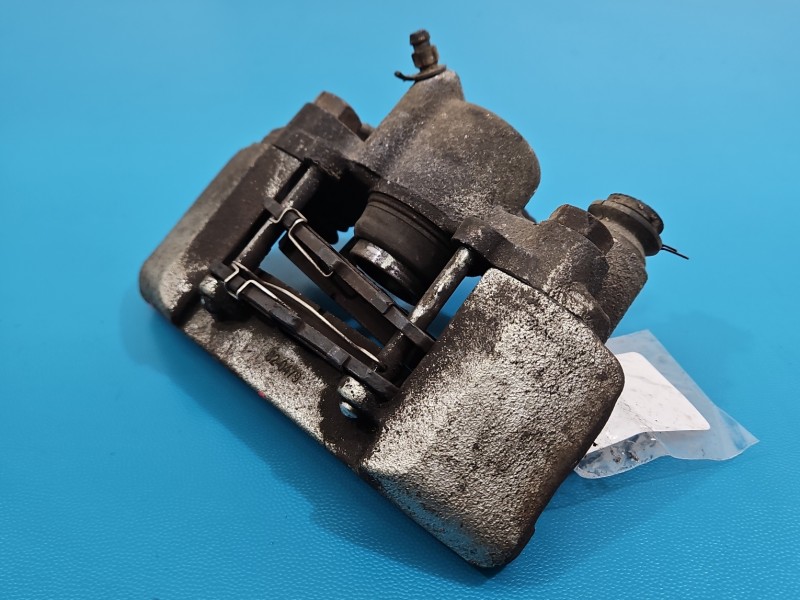 Zacisk tył lewy Toyota Yaris I 1.0 vvti HB