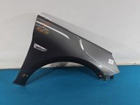 Błotnik przód prawy Opel Astra V K grafitowy z10a
