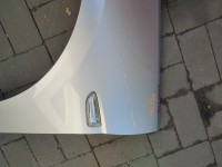 Błotnik przód lewy Opel Astra V K Z176