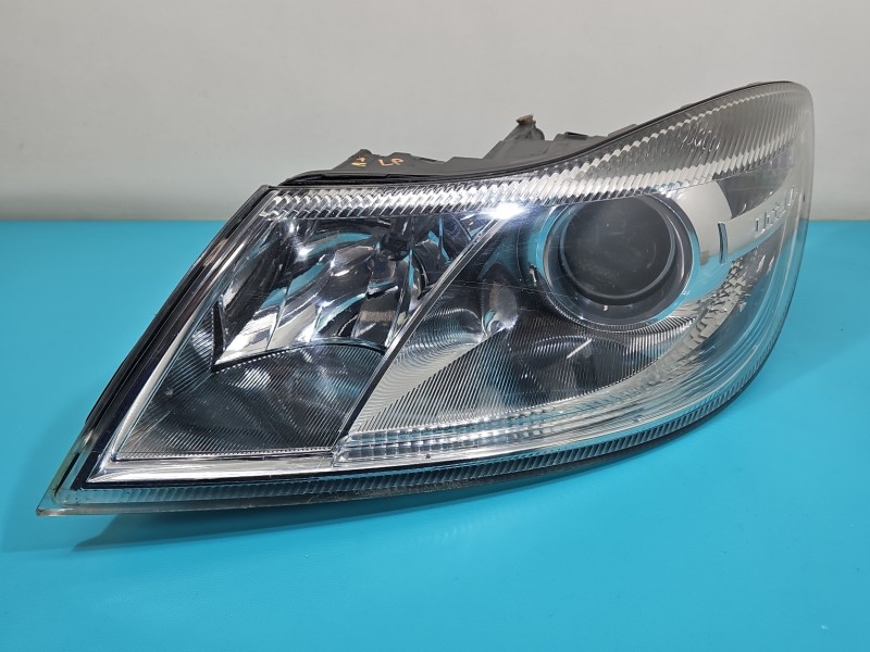 Reflektor lewy lampa przód Skoda Octavia II EUROPA