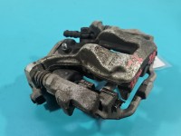 Zacisk tył lewy Toyota Corolla E21 19- sedan 1.5 12V