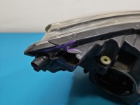 Reflektor lewy lampa przód Opel Astra IV J EUROPA 13253650
