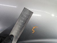 Błotnik przód prawy Nissan Almera N16 srebrny