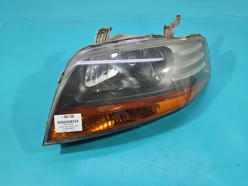 Reflektor lewy lampa przód Chevrolet Aveo T200 EUROPA 00002085