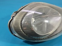 Reflektor prawy lampa przód Opel Vivaro EUROPA 7700311372, 91165720, 89005568