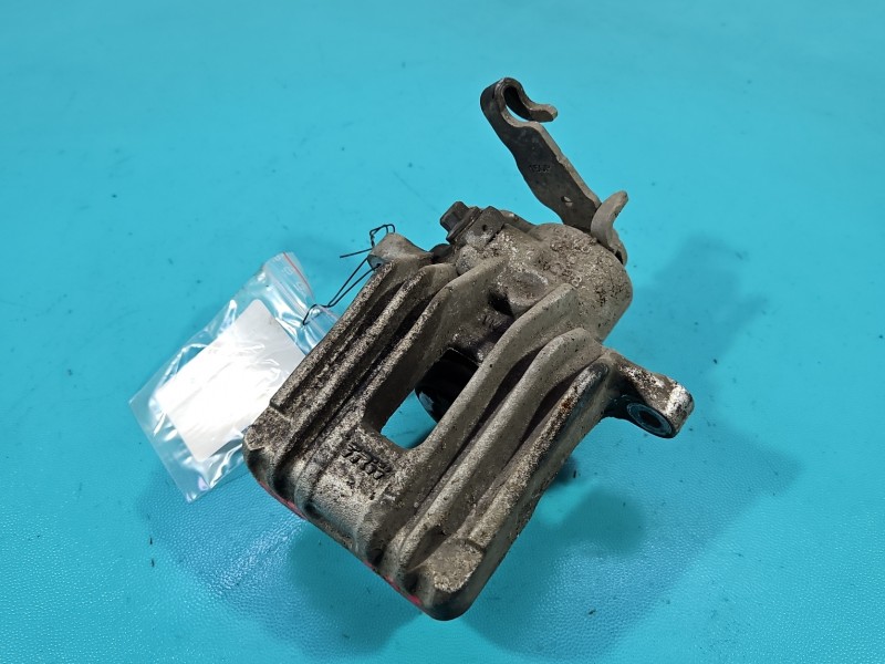 Zacisk tył lewy Skoda Scala 2019- 1.5 TSI HB