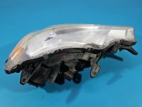 Reflektor lewy lampa przód Mitsubishi Outlander II 06-13 EUROPA