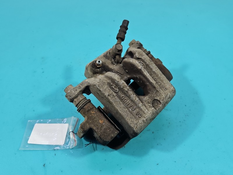 Zacisk tył lewy Hyundai Santa Fe III 12–18 HB 2.4 GDI