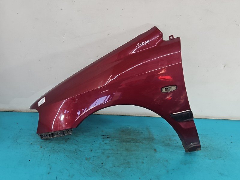 Błotnik przód lewy Mitsubishi Space star bordowy