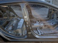 Próg prawy SŁUPEK ŚRODKOWY B Opel Astra V K kombi 5d zgnita zieleń Z10A