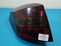 Lampa tył lewa Z BŁOTNIKA obklejona folią Renault Laguna III kombi