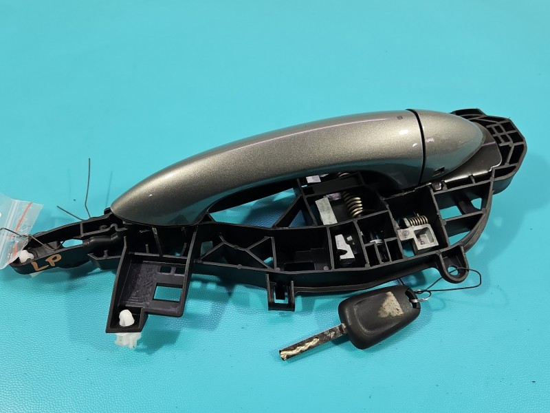 Klamka przód lewa zewnętrzna Opel Astra V K