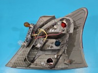 Lampa tył lewa Toyota Yaris II HB uszkodzony rant klosza Koito LIFT 09-11 led EUROPA