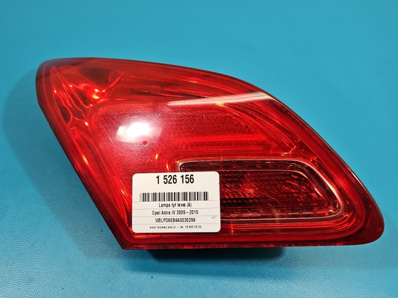 Lampa tył lewa Producent części: OPEL, 09-12 Z KLAPY BAGAŻNIKA Z LISTWĄ ŻARÓWKOWĄ hatchback Opel Astra IV J HB