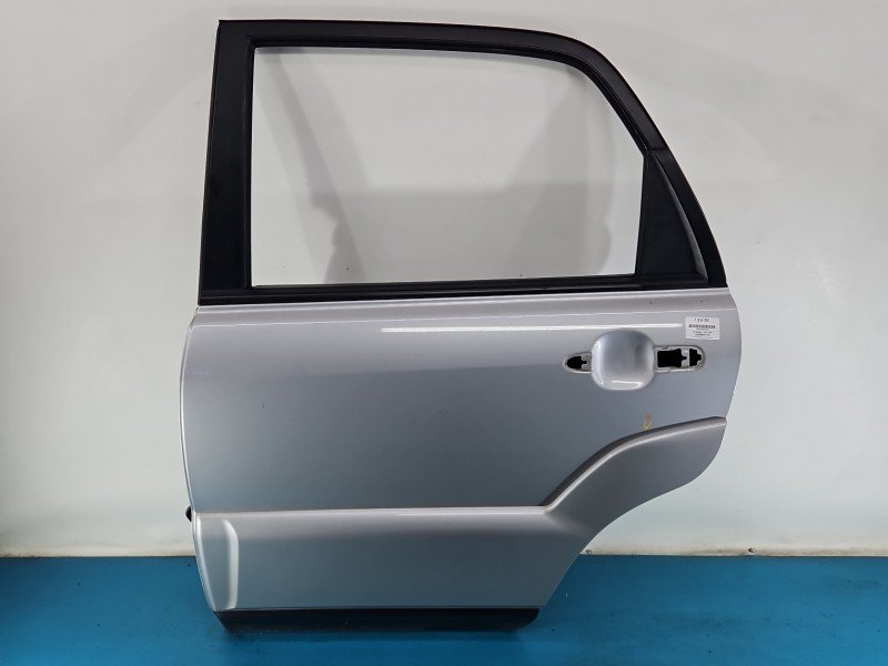 Drzwi tył lewe Kia Sportage II 04-10 HB 5d srebrny S6