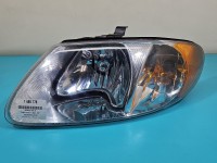 Reflektor lewy lampa przód Dodge Caravan IV 00-07 EUROPA