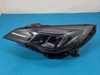 Reflektor lewy lampa przód Opel Astra V K EUROPA 39195688, 662588537