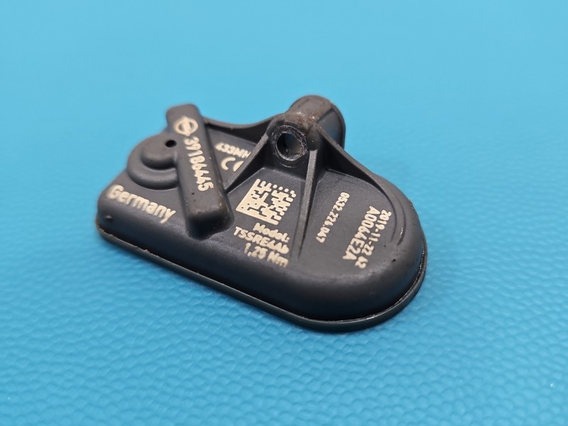 Czujnik ciśnienia opon Opel Astra V K 39186445 TPMS