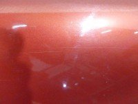 Błotnik przód prawy Mazda 626 bordowy