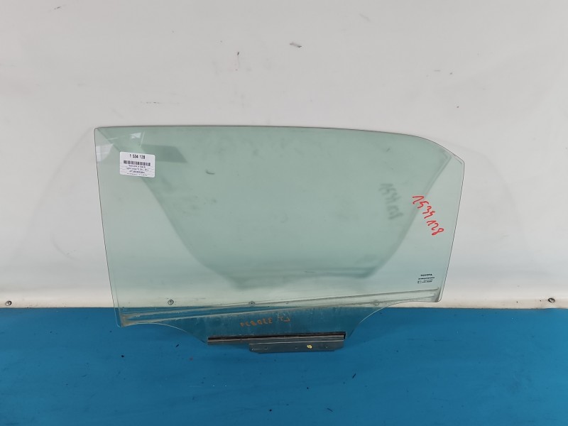 Szyba drzwi tył lewa Toyota Corolla E15 sedan