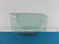 Szyba drzwi tył lewa Toyota Corolla E15 sedan