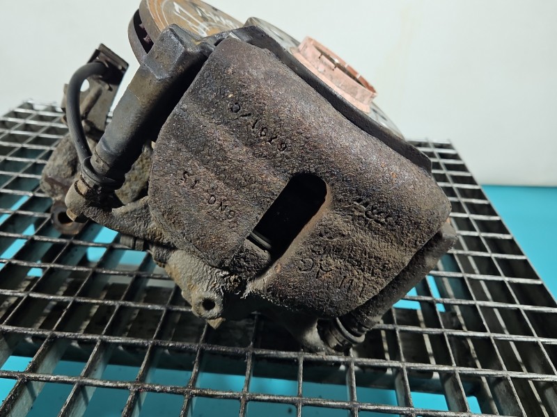 Zacisk przód lewy Skoda Octavia III 2.0 tdi