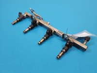 Wtryskiwacz Opel Astra III H 55559375, 3317A, 25380933 1.6 16v