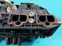 Kolektor ssący Opel Corsa D 0280600063, 55557906, 0261230101 1.2 16V (Z12XEP)