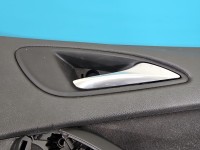 Tapicerka drzwi przód prawa boczek Opel Astra V K 2513835