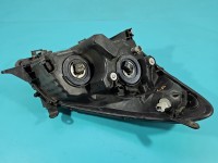 Reflektor lewy lampa przód Toyota Corolla Verso II EUROPA