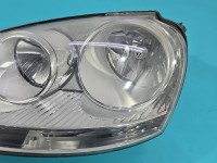 Reflektor lewy lampa przód Vw Jetta V EUROPA