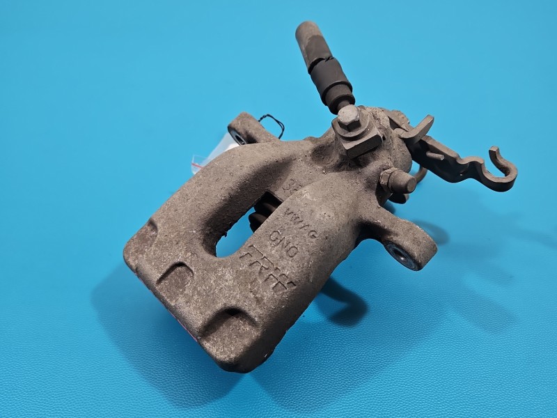 Zacisk tył lewy Skoda Octavia III 1.6 TDI (CXXB) kombi