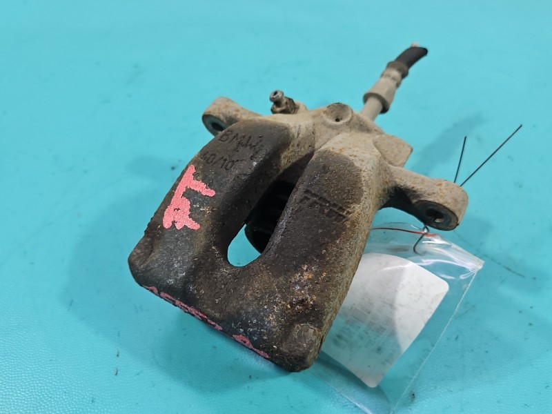 Zacisk tył prawy BMW E87 2.0d HB